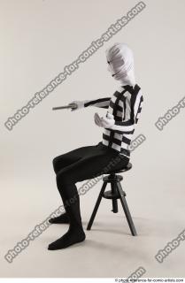 03 2019 01 JIRKA SITTING POSE WITH GUN